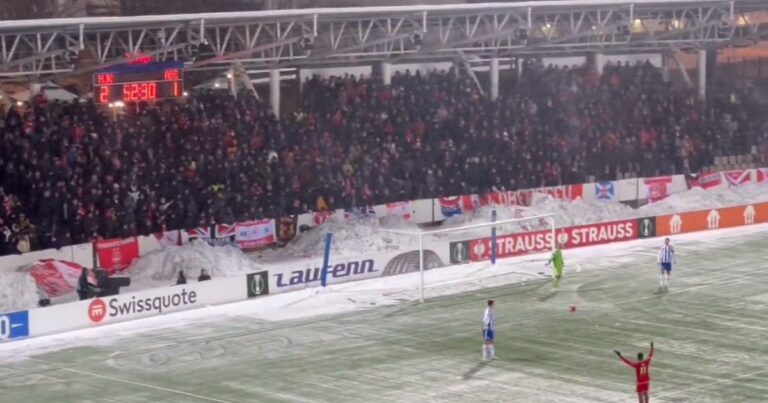 Fans throw snowballs at goalkeeper, match is interrupted