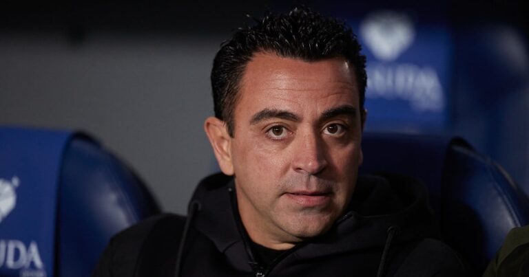 Xavi under the spell of a Real Sociedad player