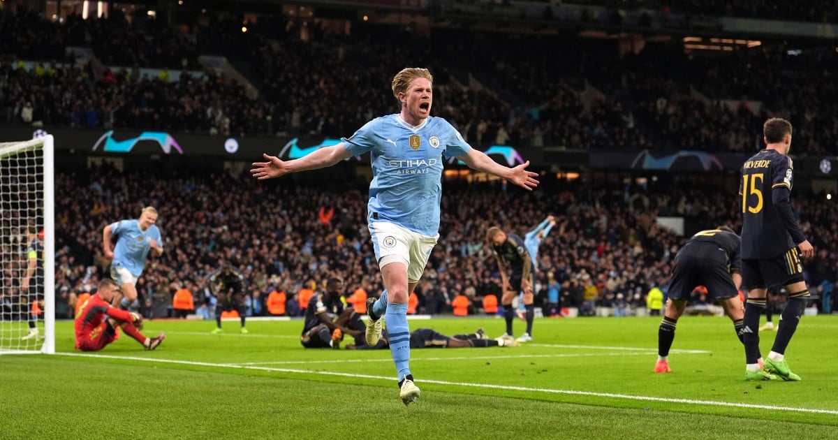 De Bruyne, Guardiola jubilant