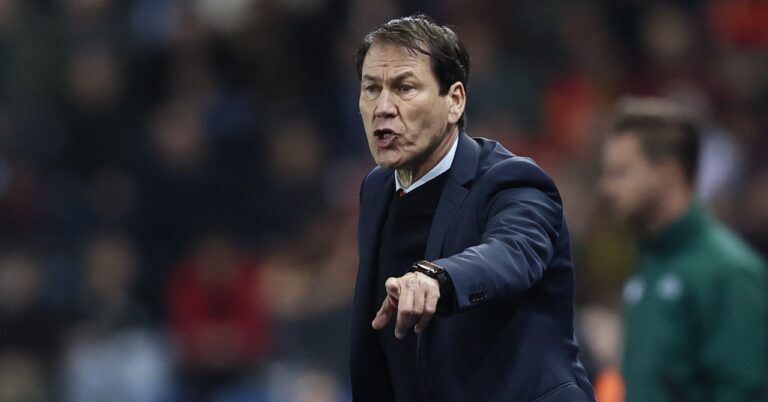 Garcia goes up to the niche for Deschamps: "He was ..."