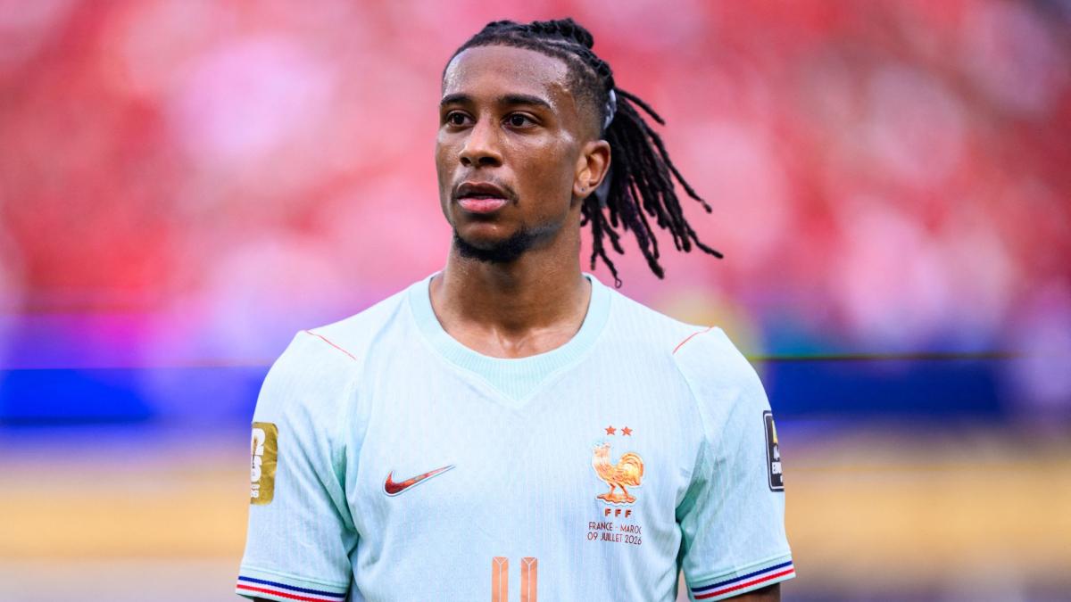 Michael Olise leaves his house in Munich