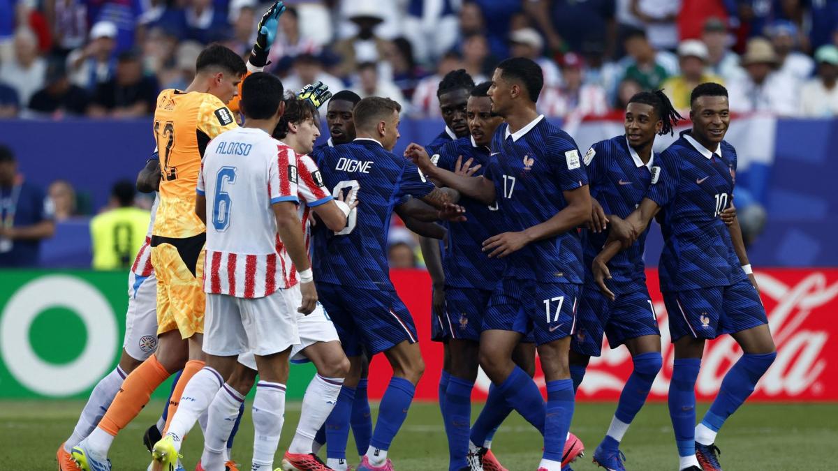 A Paraguayan player tackles the Blues after the 2026 World Cup